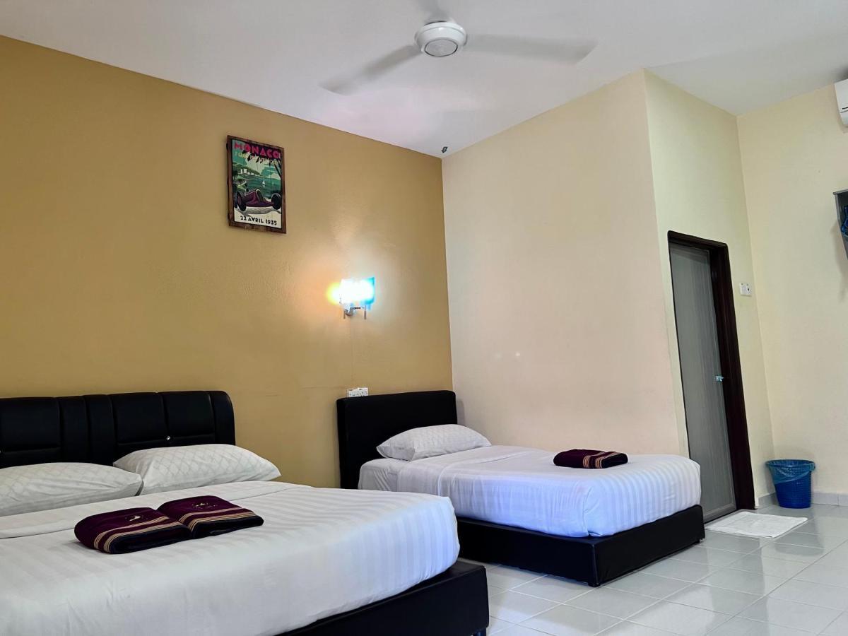Dhania Cenang Beach Motel Пантай-Сенанг Экстерьер фото